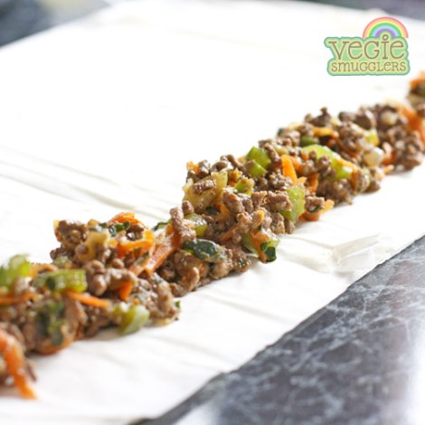 Make a line of mixture along to whole length of pastry.